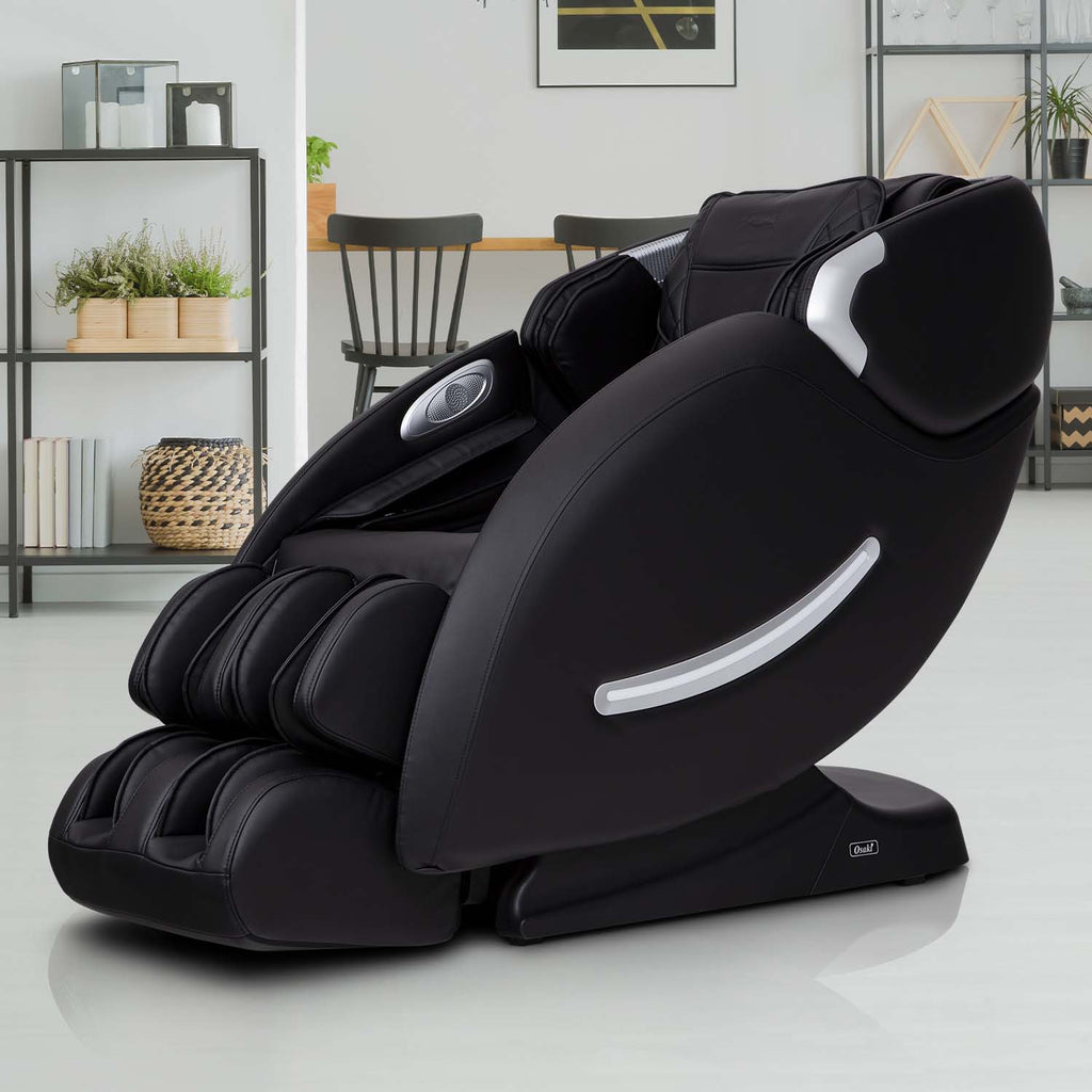 Black OS-4000XT massage chair in a room with table and chairs