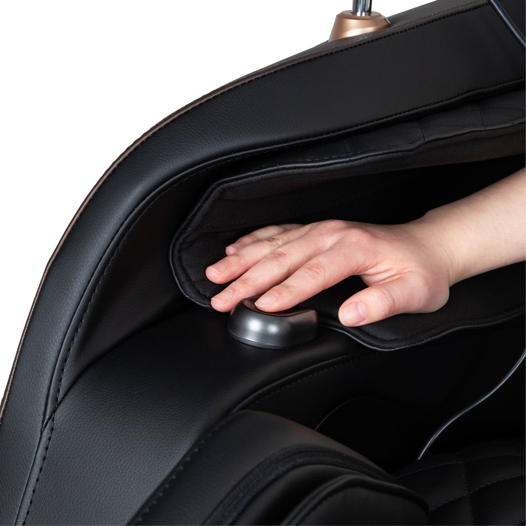 Close-up of a person's finger on the Osaki Duke XL 4D Massage Chair Health Test Sensor
